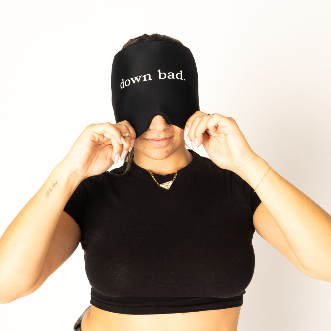 girl wearing "down bad" hangover hugg